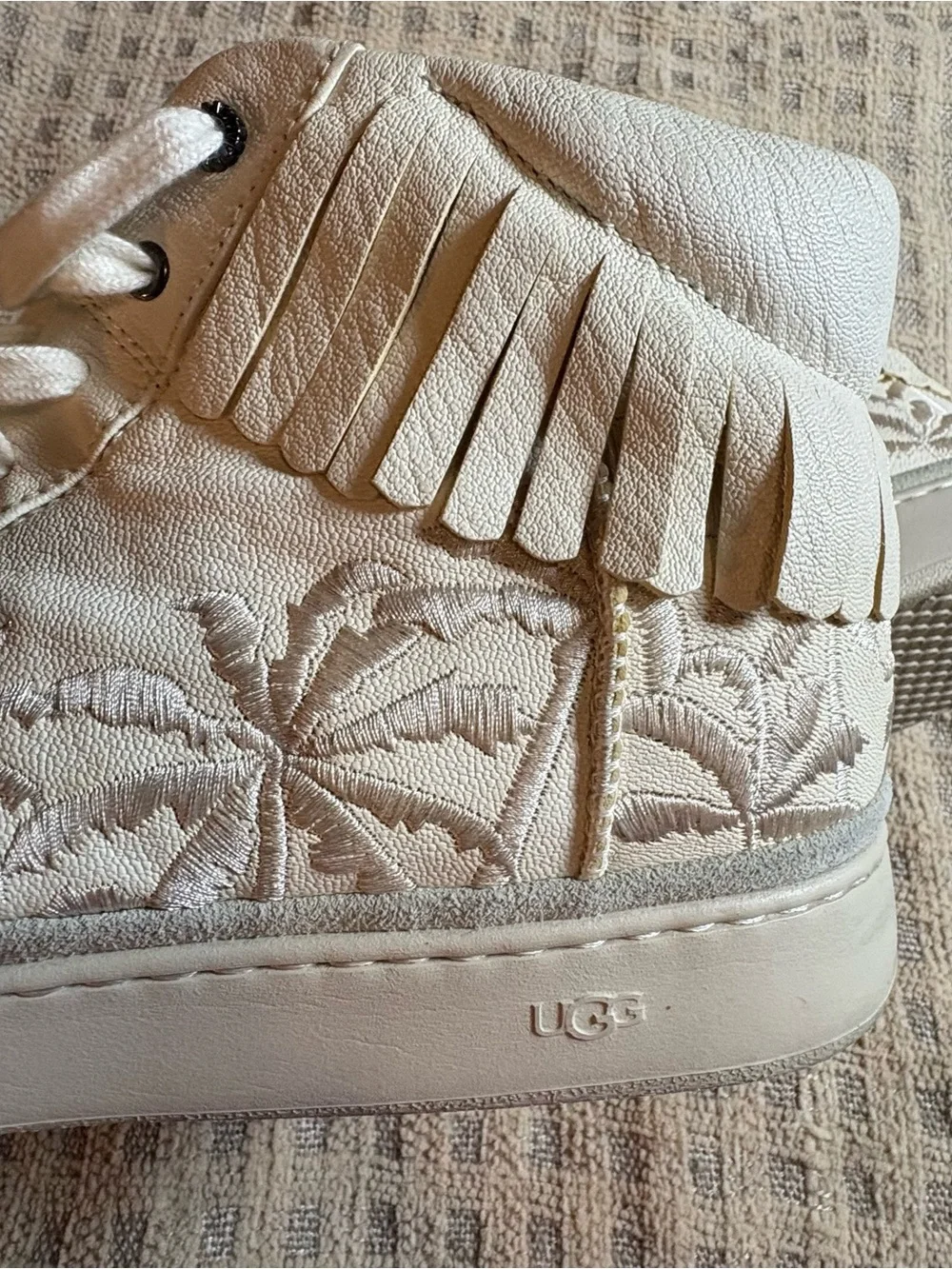 UGG Cream Leather High-Top Sneakers with Fringe